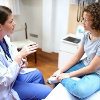 Physician with woman.